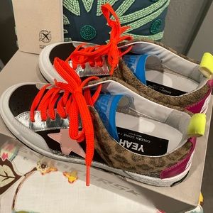 Golden goose yeah tennis shoes- worn 1 time smoke free pet free. Too big for me
